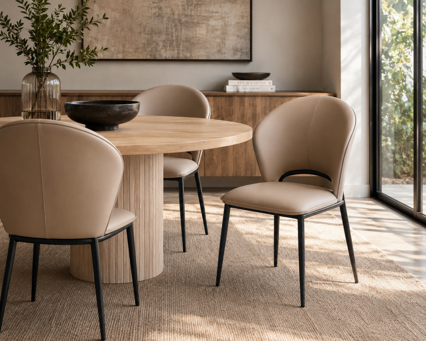 Upholstered Dining Chair with Sculpted Curved Back and Black Metal Legs